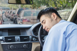 Man sleeping in traffic