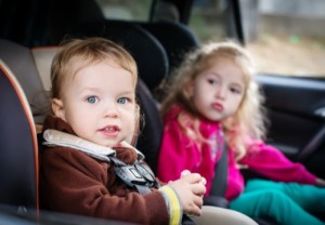Two children in car seats